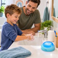 20-Second Handwashing Timer helping a child learn healthy handwashing habits with his dad at home.