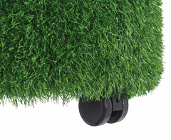Castor on the Aalto Round Grass Ottoman with tactile green grass-textured upholstery 