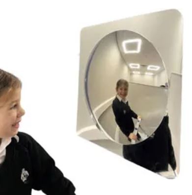 Single convex mirror with child looking at it