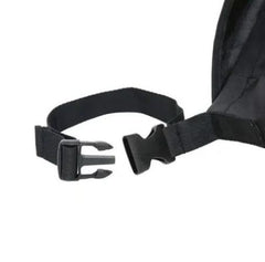 This is an image of the strap of a backpack on a wheelchair.