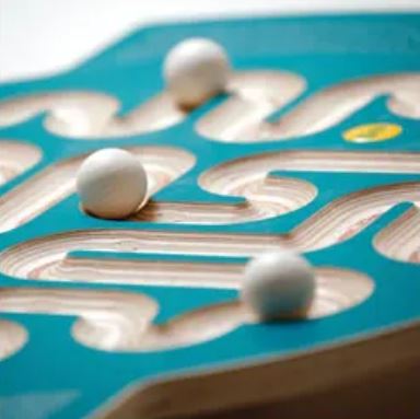 Maze Balance trackboard close up with balls on track