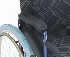 This is an image of the Oversized Bariatric Manual Wheelchair self -propelled - 250kg Weight. It is an image of the side handle and the seat  with a geometric pattern and blue wheels.