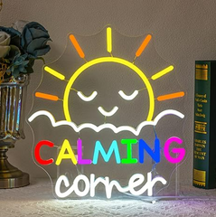 Neon sign with a sun design and 'CALMING CORNER' text on a neutral background.