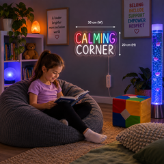 A Calming Corner sign displayed in a cozy space with a child quietly reading.