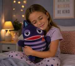 Child cuddling a Worry Eater plush toy in a calm, cosy bedroom.