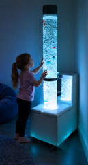 image of a child touching a bubble tube in a mobile podium