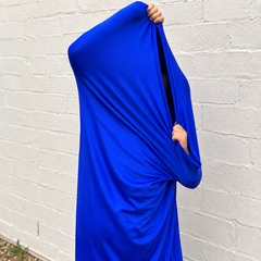 Child Hiding inside a Royal Blue Movement Tube