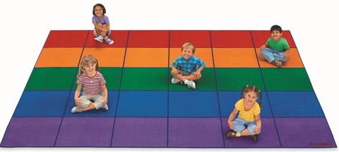 Five children sitting on the Large colour-coded classroom seating rug featuring 30 vibrant seating squares in strips of 6 colours red, orange, green, blue, and purple with non-slip backing for organised group learning, therapy sessions, schools, allied health clinics and inclusive community spaces.