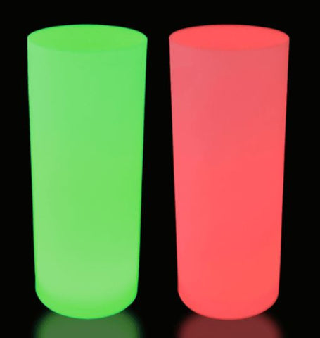 Two cylinders lit up within with green light and red light