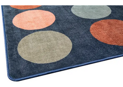 Close up of Colours of Australia classroom rug with circular pattern and earthy tones