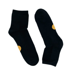 Pair of Dot On A Sock quarter crew socks with orange dot