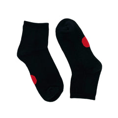 Pair of Dot On A Sock quarter crew socks with red dot