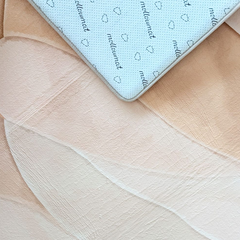 Close up of the non-slip backing of the Clay Drift Memory Foam Mat enabling a cushioned floor area for supervised learning, movement and therapy activities.