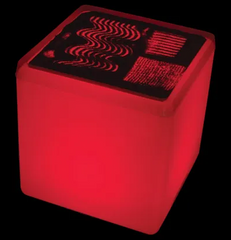 Activity sheet sitting on a red lit Extra Bright rechargeable LED light cube for sensory learning and educational activities