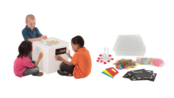 Children playing with an Extra Bright Light Cube and 268-piece accessories kit for sensory STEM learning