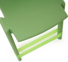 View from above of a lime green coloured Fidget Chair Band stretchy sensory band attached to a classroom chair.