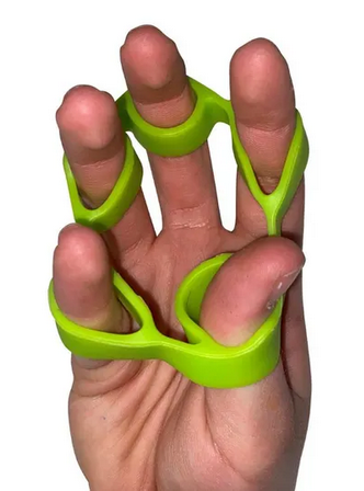 Hand with green hand strengthener 