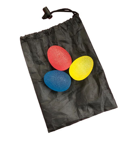 This is an image of 3 Sensory Hand Therapy Eggs There is a red, blue and yellow egg lying on a black bag.