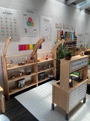 This is an image of the Wooden Interactive Play Stand and Retreat Den that has been opened up and used as shelves.