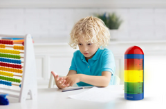 This is an image of a child using the Stoplight Traffic Light Timer.