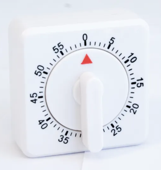 White kitchen timer with dial knob