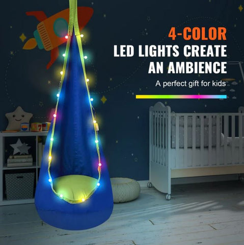 This is an image of a Blue Kids Hanging Pod with LED Lights. It is set in a baby's nursery.