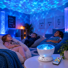 Children relaxing with an Ocean Wave Projector with Sound in a calming sensory room.