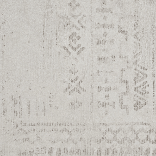 Detailed view of the soft beige, distressed stone-washed pattern and subtle geometric markings.