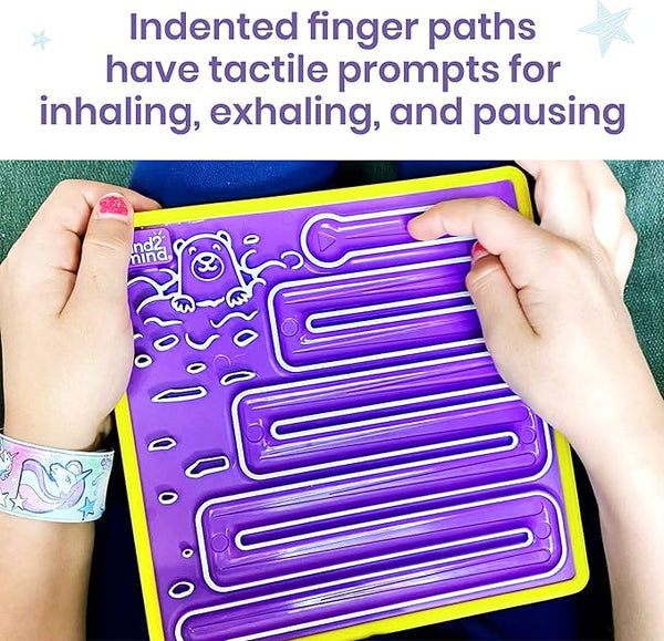 A young child's finger traces the maze on a purple Mindful Maze board