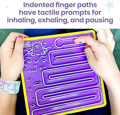 A young child's finger traces the maze on a purple Mindful Maze board