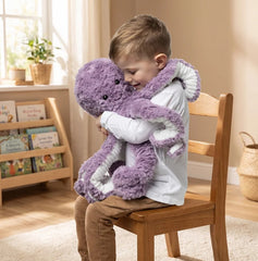 Mini & Me Weighted Plush Octopus hugged by child