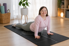 Person using Modified Yoga Fitness Mat for guided yoga and movement exercises