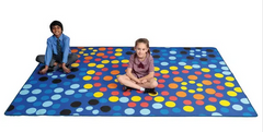 Two young students sitting on the Mosaic Sky classroom rug 3m x 2m for reading corners, mindfulness spaces, quiet learning zones, and early childhood classrooms