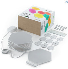 Set of hexagonal pads, a box, and additional components on a white background
