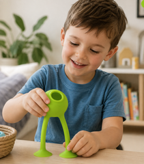 Child playing with the Oogi Bongo sensory toy at home.