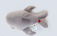 This is an image of a plush whale. It shows a red love heart on its tail.