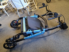 This is an image of the PAB381 Tall Heavy Duty Rollator With Gutter Arms - folded down