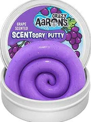 This is an image of Crazy Aarons Scentsory Putty. It is Purple and is says Grape scented