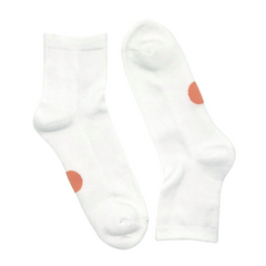 Pair of Dot on a Sock white quarter crew socks with orange dot on soles