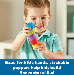 Child stacking Rainbow Emotions Fidget Poppers for fine motor development and sensory play