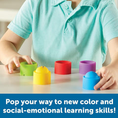 Child using Rainbow Emotions Fidget Poppers for colour matching, stacking and emotional learning