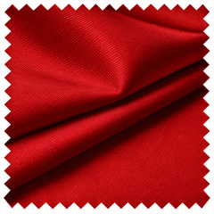 A square swatch of bright red fabric with a zigzag-cut border
