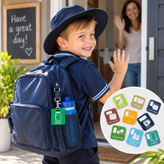 Child using School Reminder Tags on a backpack to prepare for school.