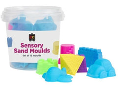 Tub of sand moulds with some moulds outside the tub