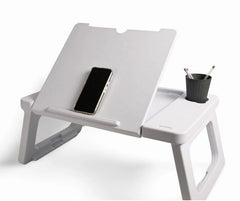 Foldable laptop desk with a phone and cup on a white background