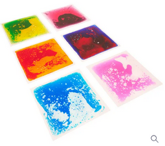 Diagonal view of the Elizabeth Richards Sensory Liquid Floor Tiles Pack of 6 used in a sensory room for interactive sensory play and calming movement activities
