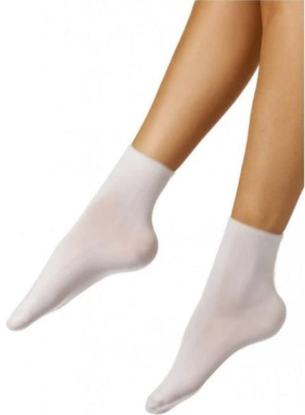 This is an image of a child wearing the Calmcare Adaptive Ankle Length Sensory Socks - white