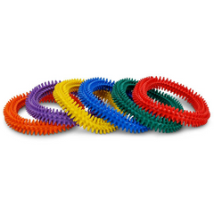 HART Spike Ring Set of six 15cm soft tactile PVC throwing rings in assorted colours for occupational therapy, movement and hand-eye coordination activities.