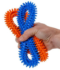 Adult hand squeezing Spike Rings 