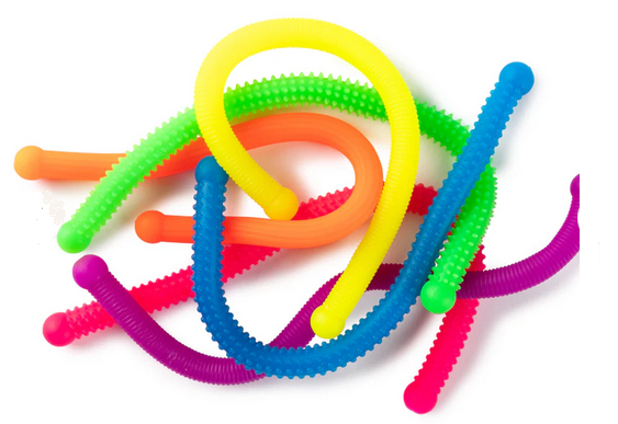 Pile of Stretch Stings in blue, yellow, orange, red, purple, and green.